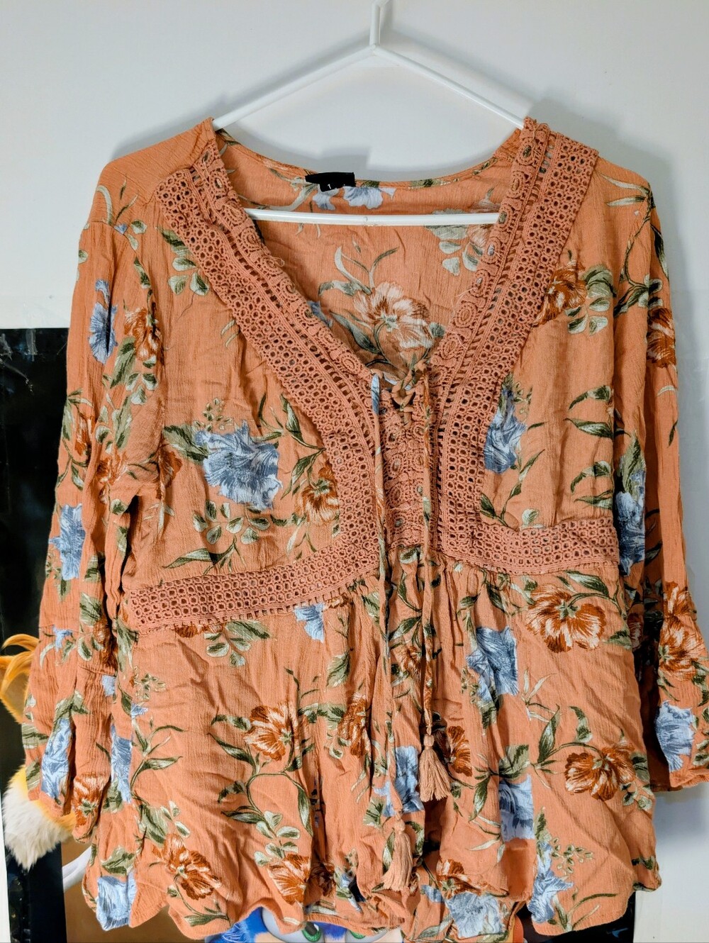 Torrid peach floral crinkle-gauze babydoll top featuring crochet trim